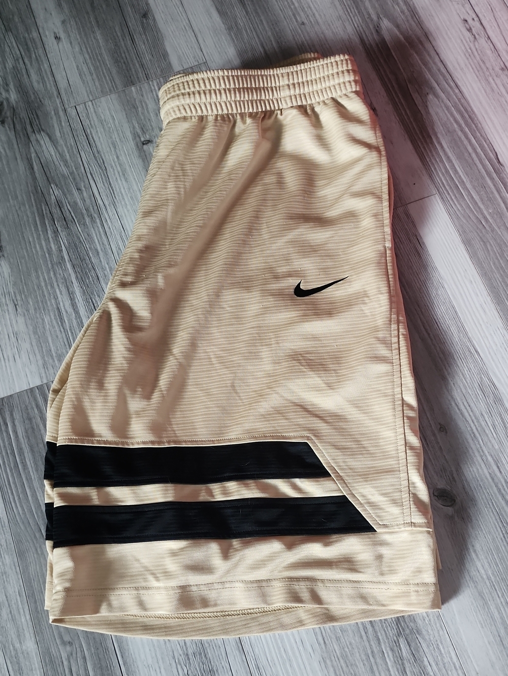 Nike Cream Athletic Shorts with Black Stripe Accents